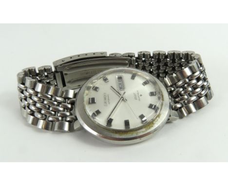 Seiko - a gentleman's DX manual mind wristwatch, the round silvered dial with thick black and silver hour markers and hands, 