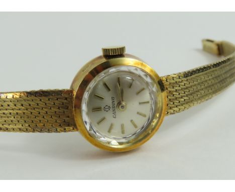 Candino - a ladies manual wind cocktail wristwatch, the small round silvered dial with gold baton hour markers and hands, on 