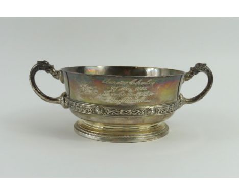 A silver sugar bowl, by Adie Brothers, Birmingham, 1932 (with import marks) circular form, mythical cast dragon handles, engr