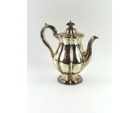A silver coffee pot, of gourd form with spaced vertical creases throughout body and engraved with a pheasant. A feather lines