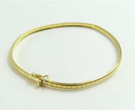 A yellow gold bangle type bracelet, composed of square, flat polished links, marked '750', 6.2cm internal diameter, 9.2g gros