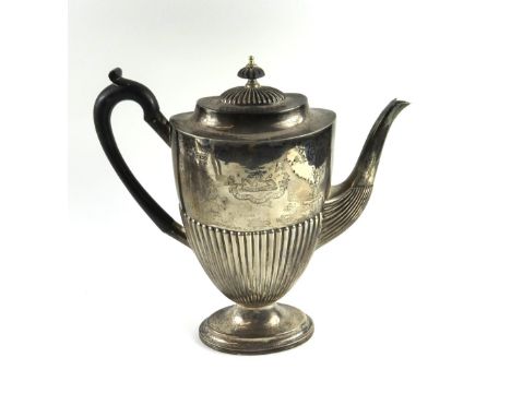 A Victorian silver coffee pot, by Mappin and Webb, Sheffield, 1893, oval form, hinged cover with wooden disc finial, wooden s