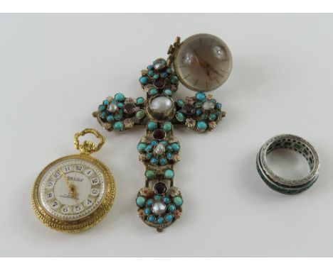A continental gilded cross set with turquoise, pearl, foiled backed stones and enamel, the clusters of turquoise and pearls a