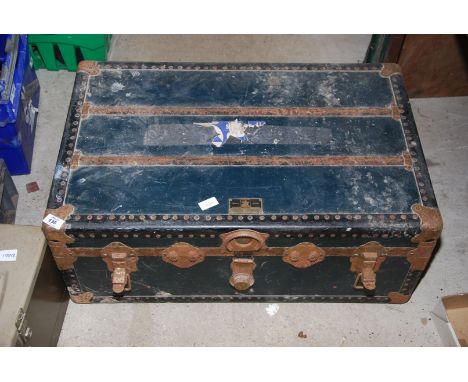 A "Victor Luggage" metal bound trunk.
