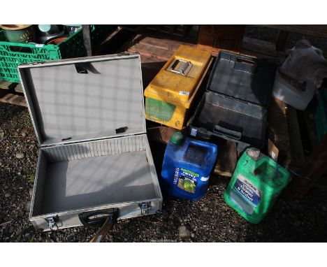 Chainsaw  OIl, decking cleaner and three empty cases.