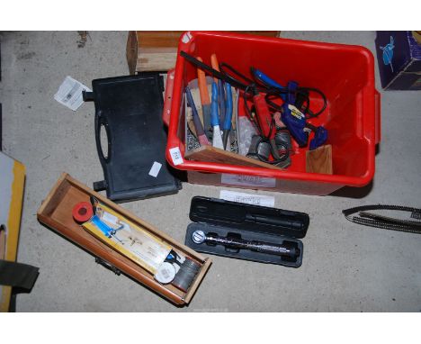 A Clarke torque wrench, wood burning iron, clamps, etc.,