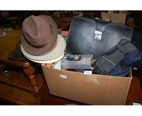 A box of gent's Hats including "Christie's, London", scarves and gloves plus a briefcase.