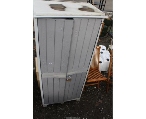 Plastic storage cupboard, planter and water butt with tap.