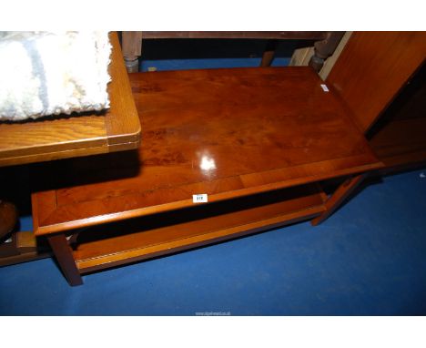 A Mahogany Coffee Table with lower shelf, 20 1/2'' x 42'' x 18 1/2'' high.