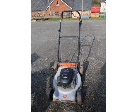 Flymo Sprint Lawn Mower (no cutter blade) with Briggs & Stratton engine (turns).
