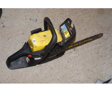 A McCulloch Chainsaw, good compression, 13'' cutter bar with end sprocket.