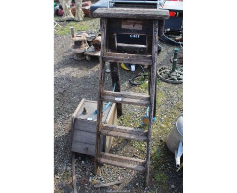 Wooden step ladder and coal scuttle.