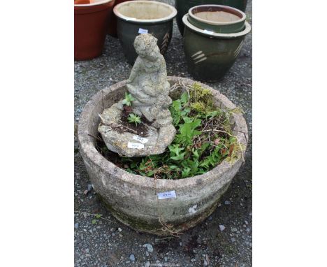 Concrete planter and ornament.