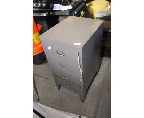 A four drawer cabinet with various tools, socket set, small G-clamps, hand drills, etc.