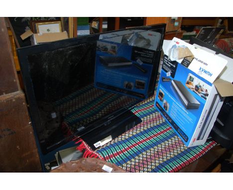 A 31" screen Toshiba TV [sold as seen] and a Humax smart free view HD recorder