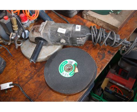 A 9'' Black & Decker professional Angle Grinder with 10 stone cutting discs.