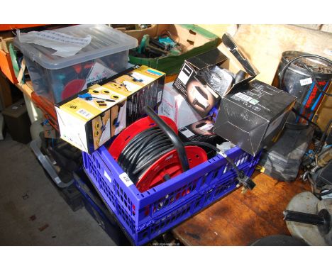 Solar garden light, furniture moving kit and an extension lead.