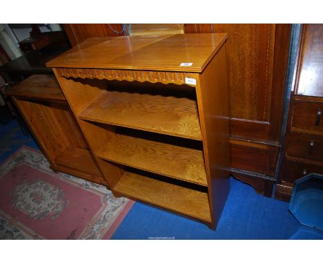 A light Oak Bookshelves, 29 1/2'' wide x 12 1/2'' deep x 39 1/2'' high and a Pine Bookcase, 26'' wide x 10 1/2'' deep x 30 1/
