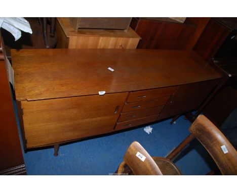 A Teak Buffet Sideboard, 67'' wide x 18 1/2'' deep x 28 1/2'' high.