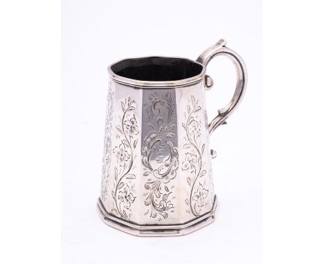 A 19th century silver plated christening mug, not marked, of octagonal form, with engraved panels and high C scroll handle, 1