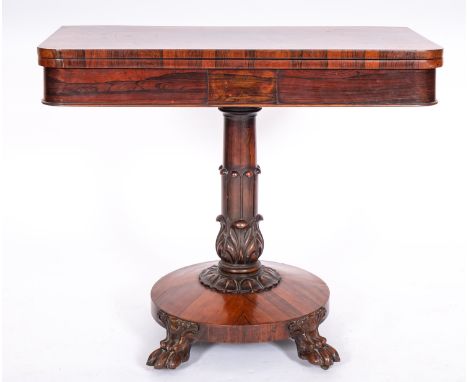 A William IV rosewood card table, circa 1835; the rectangular foldover swivel top with rounded corners and green baize inset,