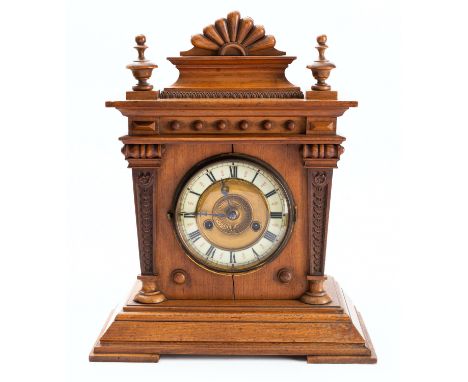 Hamburg American Clock Company, an Edwardian oak mantel clock the fourteen-day duration movement striking on a gong with the 