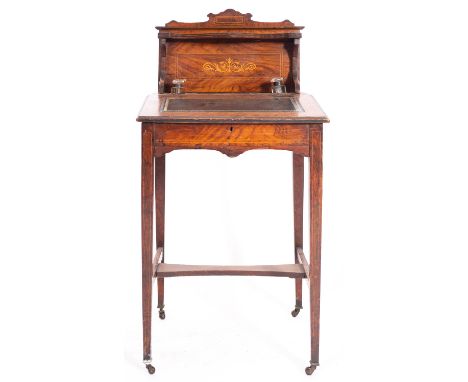 A Victorian rosewood and inlaid bureau, circa 1890; with sycamore stringing throughout, the back gallery with shaped top abov