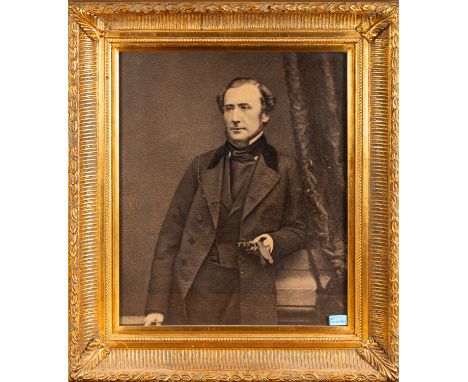 A gilt frame, sight 59.5 x 49cm, housing a photographic print of Charles Butler; together with an oval mirror, the plate 38 x
