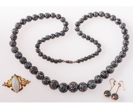 A brooch and a pair of drop earrings, an ornate openwork brooch set with a marquise-cut opal cabochon, measuring approx. 30mm