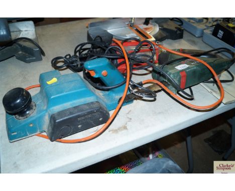A Bosch reciprocating saw, inspection lamp and a Black &amp; Decker planer