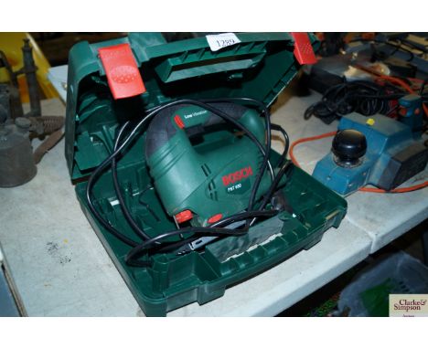 A Bosch PST650 electric sander in case