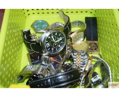 A box containing Manchester United keyring; Pulsar, Sekonda, Rotary and other wristwatches