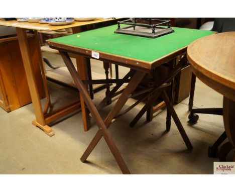 A folding card table