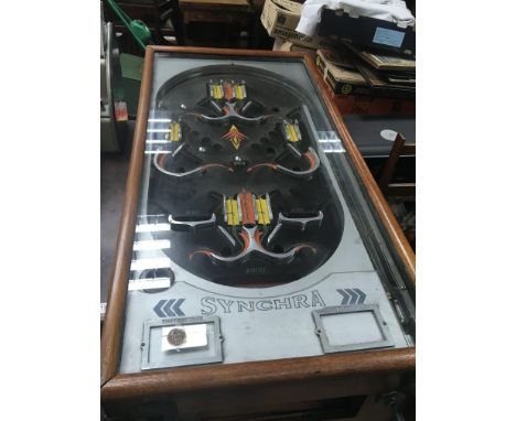 A rare Vintage pinball table The Synchra an old penny operated manual mechanical table seen to work.