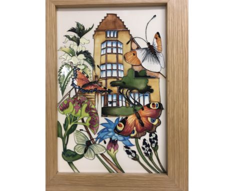 A framed trial moorcroft tile depicting butterflyâ€™s and foliage 20 cm by 30 cm by Emma Bossam .
