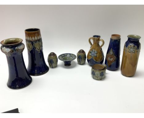 A collection of Doulton ceramic items. (9)