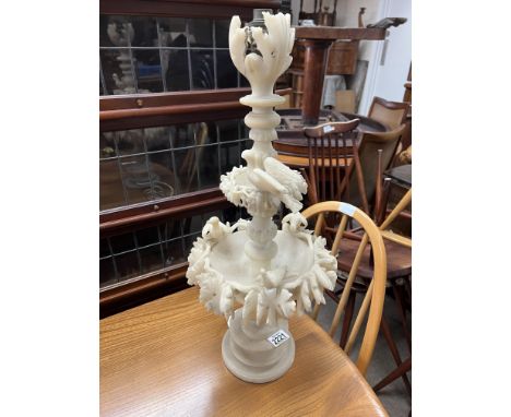 A large carved alabaster centrepiece/ table lamp (some small pieces missing). 63cm - NO RESERVE