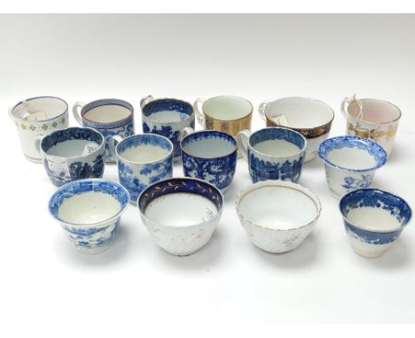 A collection of various 18th and 19th century tea cups and tea bowls, including Spode, Minton, Davenport, Derby etc