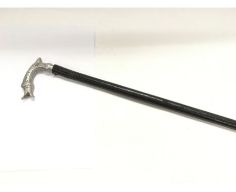A swordstick with handle in the form of an animal head.