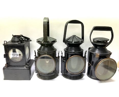 4 Antique Railway lanterns to include 1 LNER square body lantern, 2 Military issue signal lamps 1943/44 lanterns, and 1 Briti