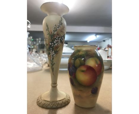 A Blush Ivory Royal Worcester bud vase decorated with white heather sprig together with a Royal Worcester bud vase decorated 