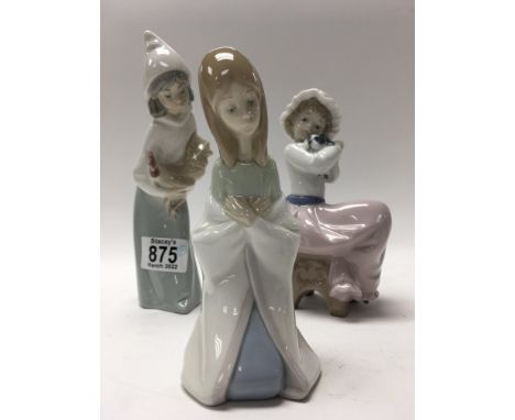 Lladro figures including girl holding chicken, seated girl with puppy, and kneeling girl. Together with three Nao Ducks