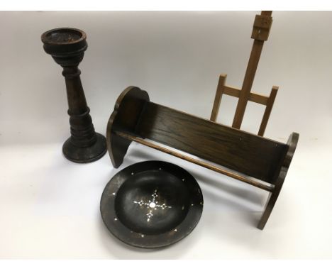An oak book stand, a wooden church collection plate and ecclesiastical candlestick, small easel, bamboo racks etc.