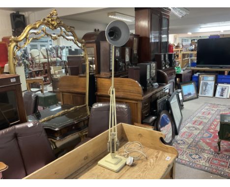 A vintage metal angle lamp