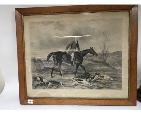 A late Victorian print of a huntsman and hounds in an original maple frame 78cm wide hight 66cm.