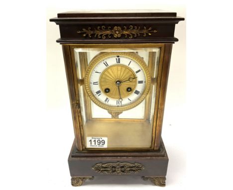 A French brass and walnut 4 glass mantle clock with gilt brass and enamelled dial. 33cm x 19cm x 13cm.
