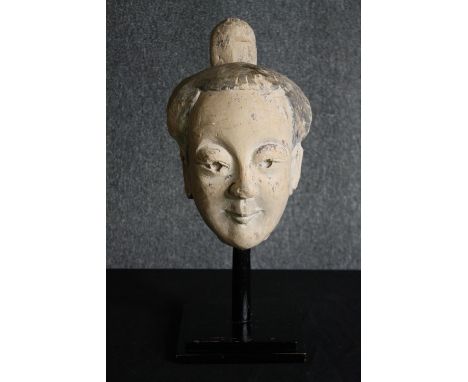 † A 19th century Chinese ceramic head, Sichuan province. H.48cm. 