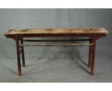 † A 19th century Chinese painted elmwood altar/console table, H.83 W.176 D.34cm. 