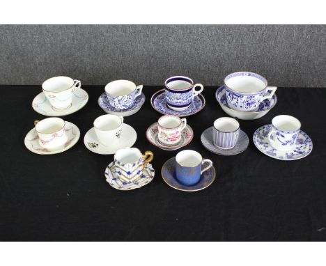 A group of various porcelain cups and saucers. H.6cm. (largest). 