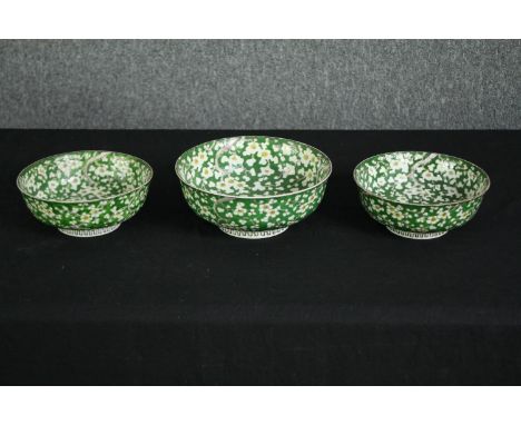 Three 20th century Chinese prunus blossom porcelain bowls, with underglaze blue seal marks. H.9 Dia.12cm. (largest). 